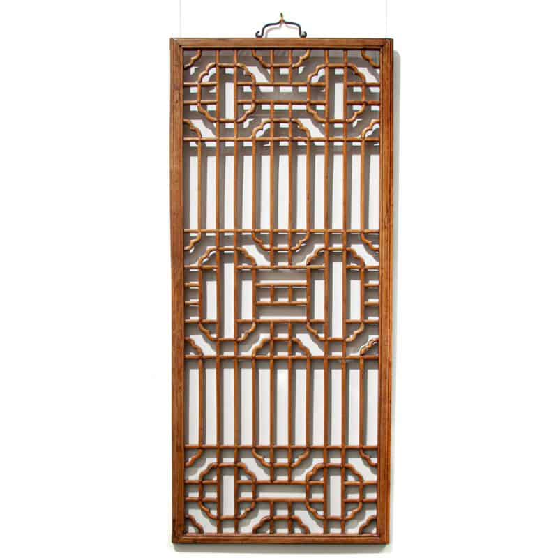 wooden lattice over windows represents