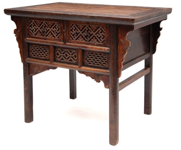 Two drawer table with deep relief carving (side)